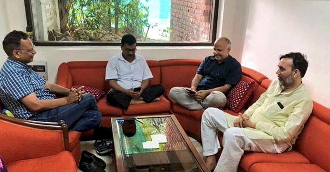 Delhi Chief Minister Arvind Kejriwal and members of his Cabinet during a sit-in protest at Lieutenant Governor Anil Baijalâ€™s residence in New Delhi on June 16, 2018.