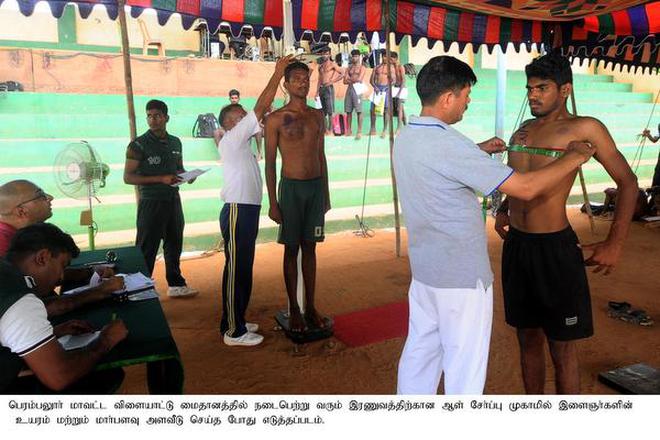 Physical measurements of candidates being checked by army personnel during the army recruitment rally at Perambalur on Tuesday.