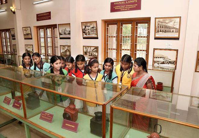 Students looking at exhibits during a visit to at Rail Museum organised as part of World Heritage Day in Tiruchi on Wednesday.