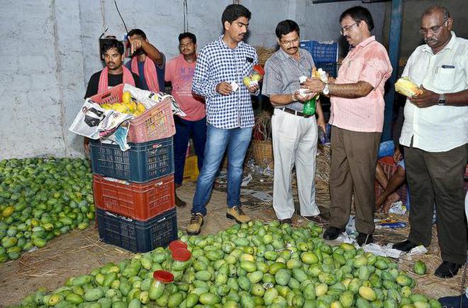 Image result for 4 hour long raid in Koyambedu, police checked 39 shops to be using artificial agents to ripen Mangoes