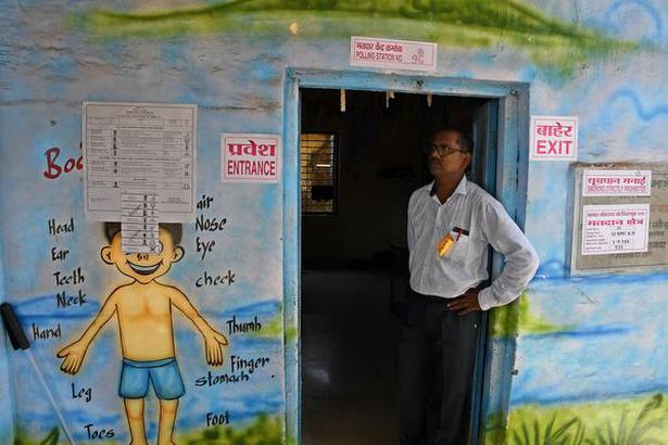 Mumbai: May 28, 2018. The poling officer looking for voters during a lean hours at Kavada-ThakarPada village in Talasari Taluka of Palghar district on Monday. The by-election for Lok Sabha seat in Palghar of Maharashtra being conducted today. Photo: Arunangsu Roy Chowdhury.