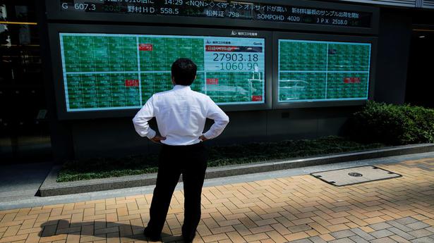 Asian shares rise, eyeing Ukraine, higher energy costs