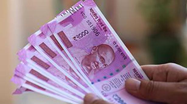 Rupee falls 23 paise to close below 74-level against U.S. dollar