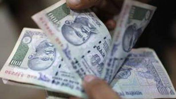 Rupee gains 11 paise to close at 74.24 against U.S. dollar
