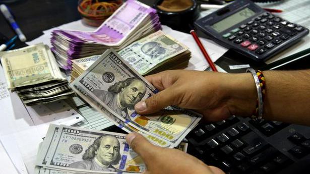 Rupee pares initial losses, settles 9 paise up at 72.65 against U.S. dollar