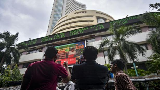 Sensex, Nifty scale new peaks; TCS tanks over 6%