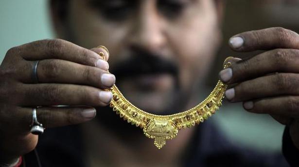 Gold plunges ₹ 302; silver declines by ₹ 597