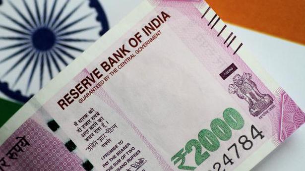 Rupee surges 11 paise to close at 72.35 against U.S. dollar