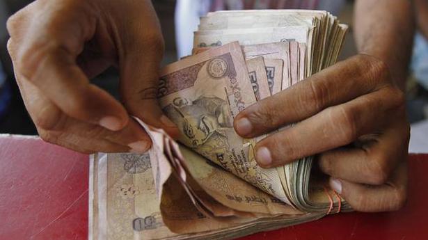Rupee gains 11 paise to finish at 73.04 against U.S. dollar