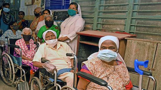 Elders arrive in wheelchairs to vote