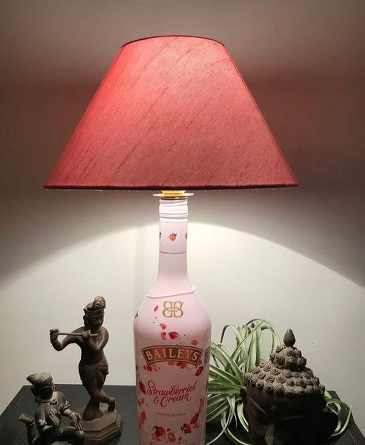Lamp shade created out of liquor bottles from Boozy Lamps