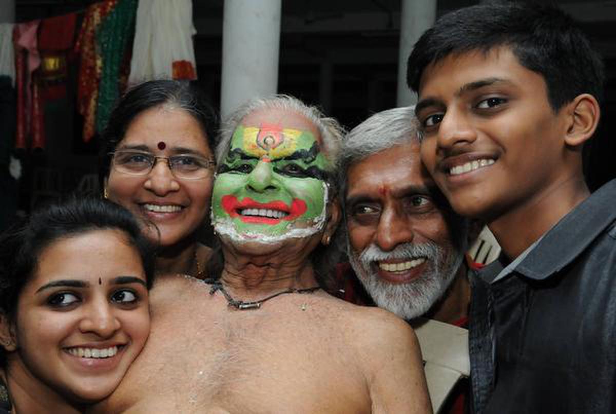 Kunhiraman Nair with his family after a performance in 2013