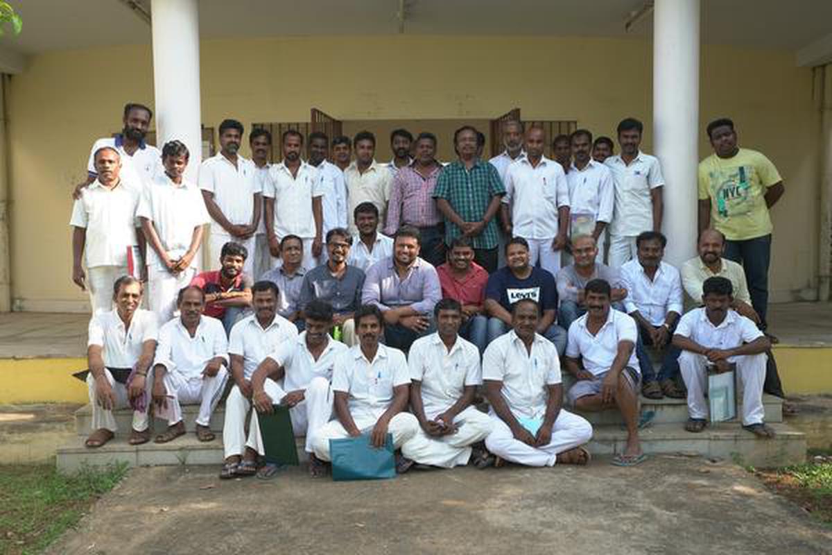 Photograph taken during a theater workshop held at Puzhal Central Prison in 2016;  Filmmaker Anees and music composer Ghibaran are present.