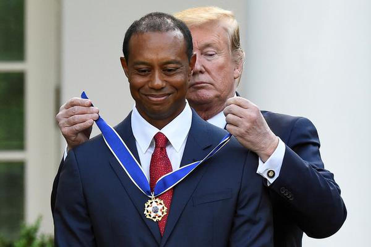 Tiger Woods is awarded the Presidential Medal of Freedom, the nation's highest civilian honor, by U.S. President Donald Trump in 2019