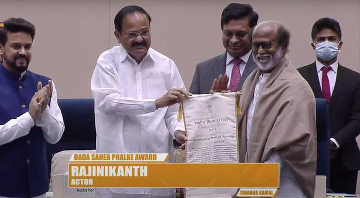 Rajinikanth receiving the award