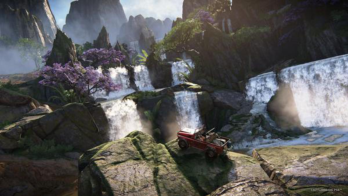 Still from 'Uncharted: Legacy of Thieves Collection' games, for the PlayStation 5. Available from January 28, 2022. The screenshot shows Chloe Frazer and Nadine Ross in a 4x4 in ‘Uncharted: The Lost Legacy’