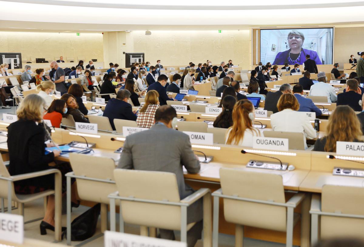 Michelle Bachelet, UN High Commissioner for Human Rights, is pictured on a screen during her video address to the Human Rights Council special session on human rights situation in Ukraine, at the United Nations in Geneva.
