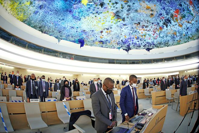 Delegates observe a minute of silence during the special session on the situation in Ukraine of the Human Rights Council at the United Nations in Geneva, Switzerland on March 4, 2022. 