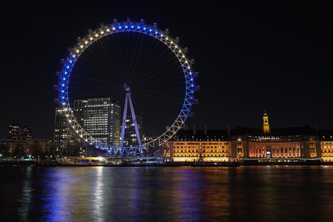 The London Eye is lit up in the colours of the Ukraine flag, in London on February 25, 2022. 