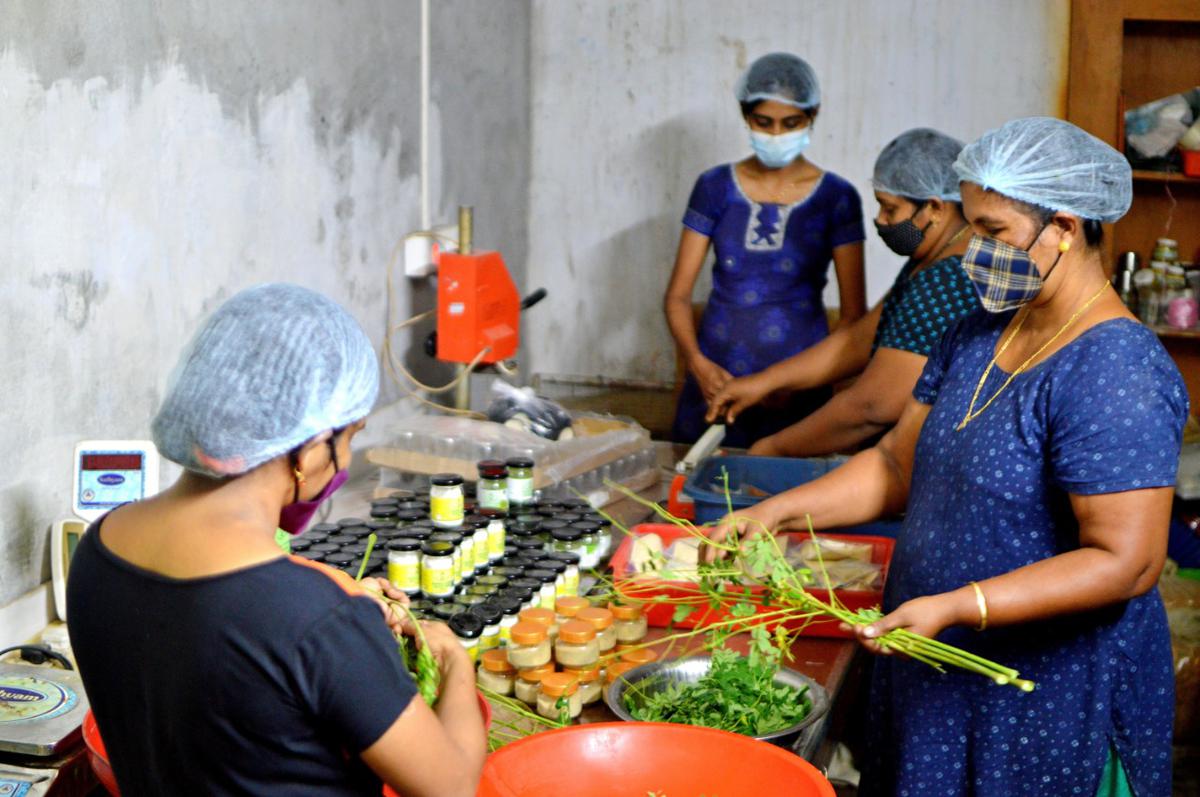 Women at work at Ambika Somasundaran's food processing unit, Kariat Dry Foods, in Marottichal, Thrissur