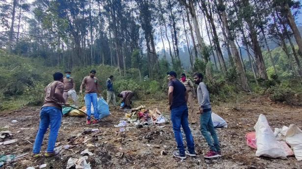 Volunteers clean up illegal dump yard near Kotagiri to minimise gaur deaths from plastic consumption 