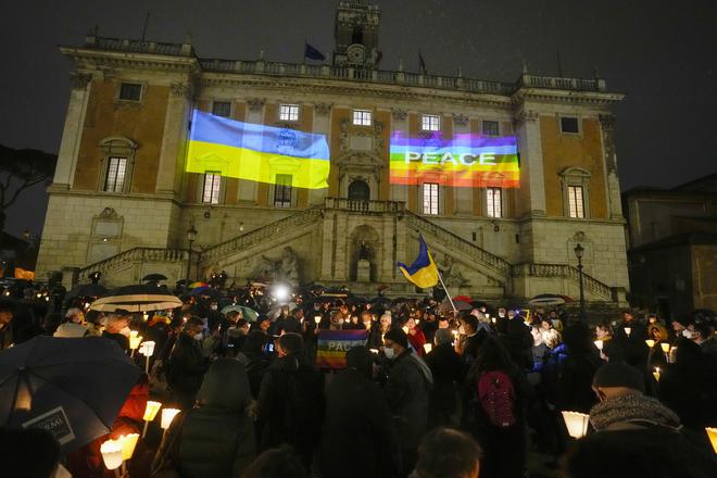 People gather in front of Rome’s Piazza del Campidoglio city council square to protest against the Russian invasion of Ukraine, on March 4, 2022. 
