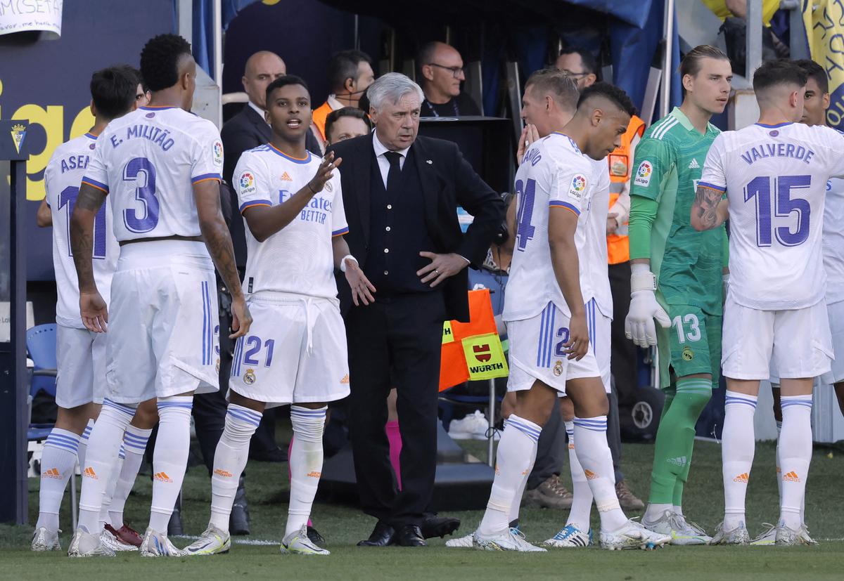 Real Madrid coach Carlo Ancelotti talks to his players during a La Liga match. File