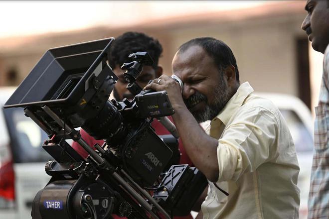 Film director Kamal KM behind the camera on the set of ‘Pada ‘