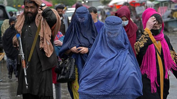 Afghanistan's Taliban order women to cover up head to toe