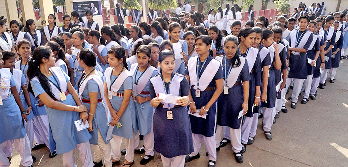 Students outside an examination centre in Bhubaneswar. 