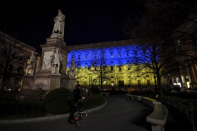 The Palazzo Marino in Milan, Italy, is lit up in the colors of the flag of Ukraine following the Russian attack of Ukraine.