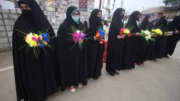 In Srinagar, activists distribute flowers, chocolates to hijab-wearing students