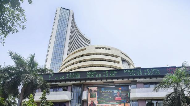 Markets reverse early gains in volatile trade; Sensex falls 236 points