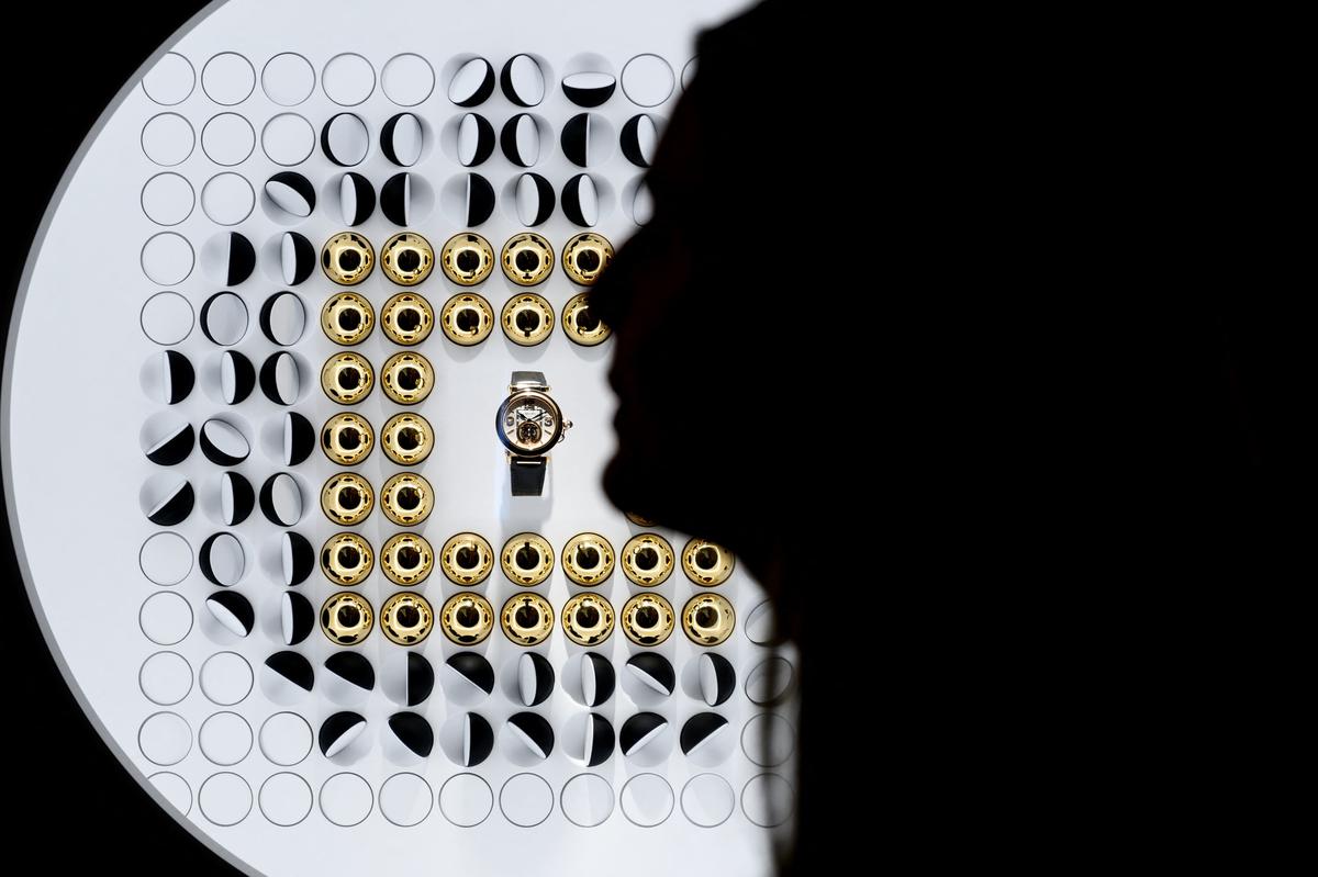 A watch displayed in a window of French luxury goods Cartier, owned by Richemont group, on the opening day of the Watches and Wonders Geneva show, in Geneva on March 30, 2022.