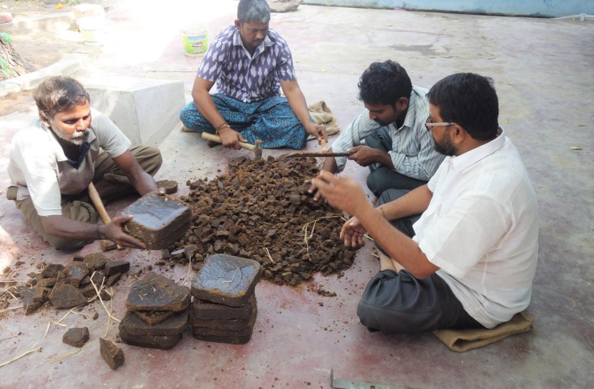 Kalamkari artists preparing black dye from black jaggery in Pedana of Krishna district. 