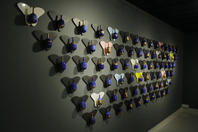 An installation of 75 ceramic artworks by Vinod Daroz 