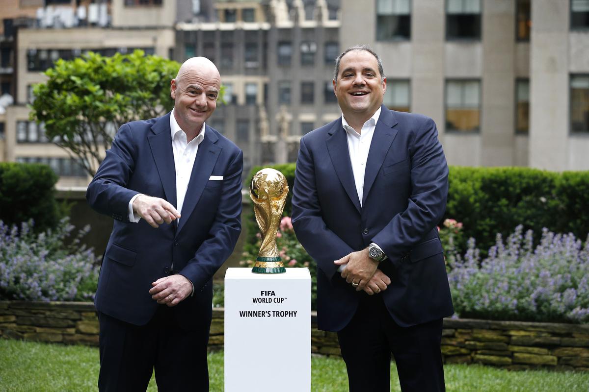 FIFA President Gianni Infantino, left, and Vice President Vittorio Montagliani stand with the FIFA World Cup trophy in New York