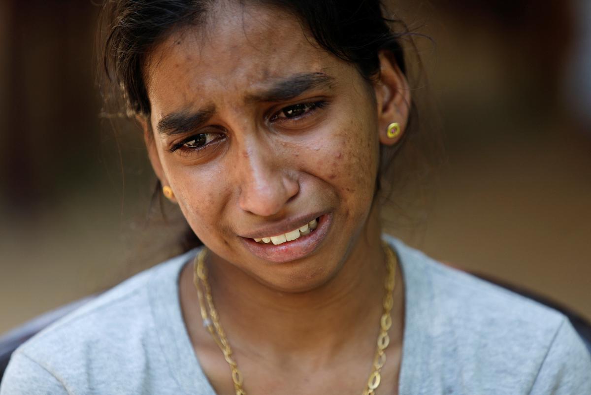 Piumi Upekshika Lakshani, daughter of Chaminda Lakshan, who was killed in the police shooting. 