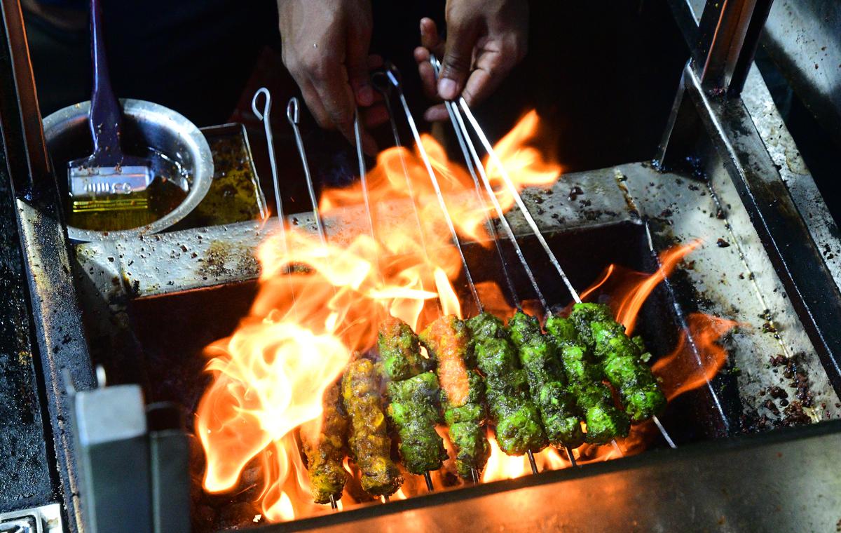 Kebabs on the grill at Kottaimedu