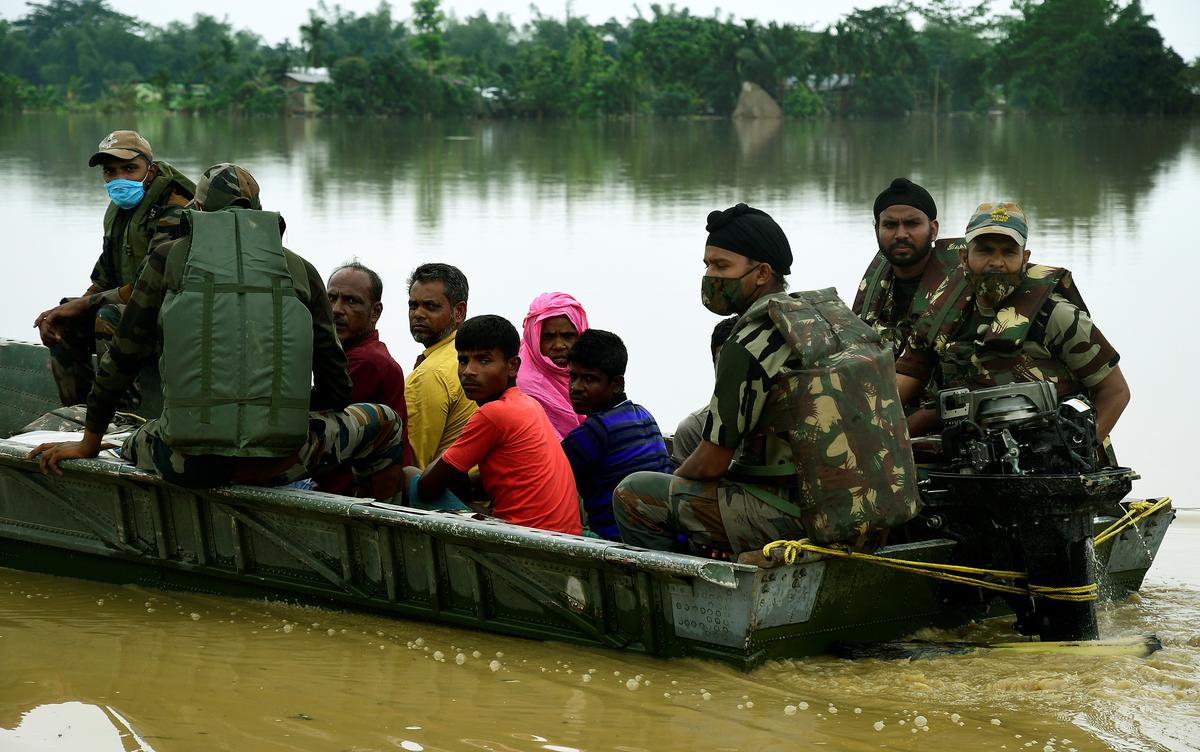 Villagers are being rescued by Indian army in flood affected Jamunamukh area in Hojai district of Assam on May 20, 2022.