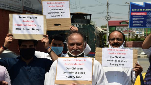 Kashmiri migrant pandits demand hike in monthly relief, stage protest in Jammu