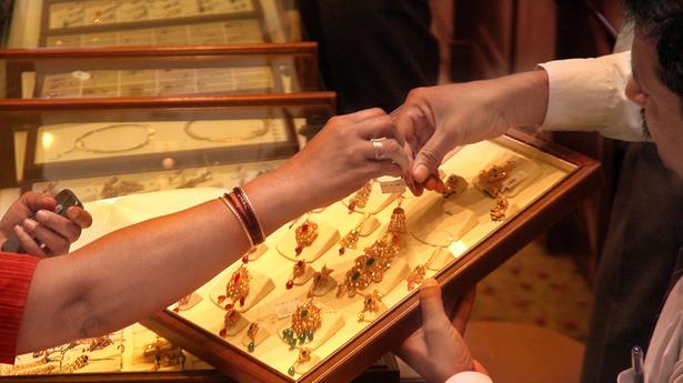 Gold tumbles ₹ 200; silver jumps ₹ 193
