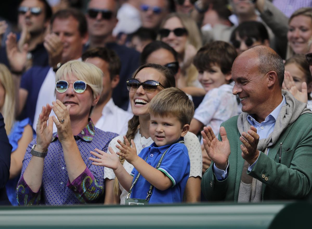 Jelena Djokovic (in white), wife of Novak Djokovic, and their son at Wimbledon in 2018. File