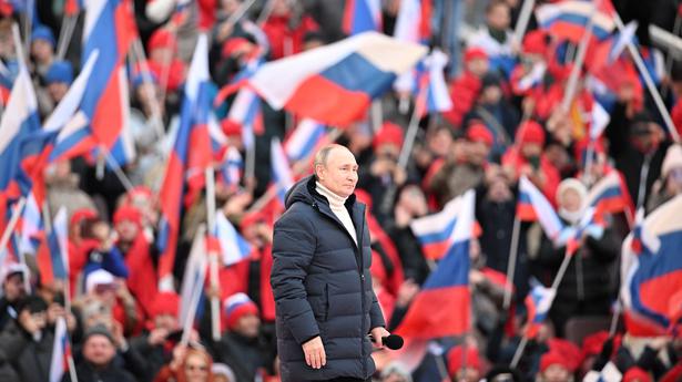 Putin appears at big rally in Moscow as troops press attack in Ukraine