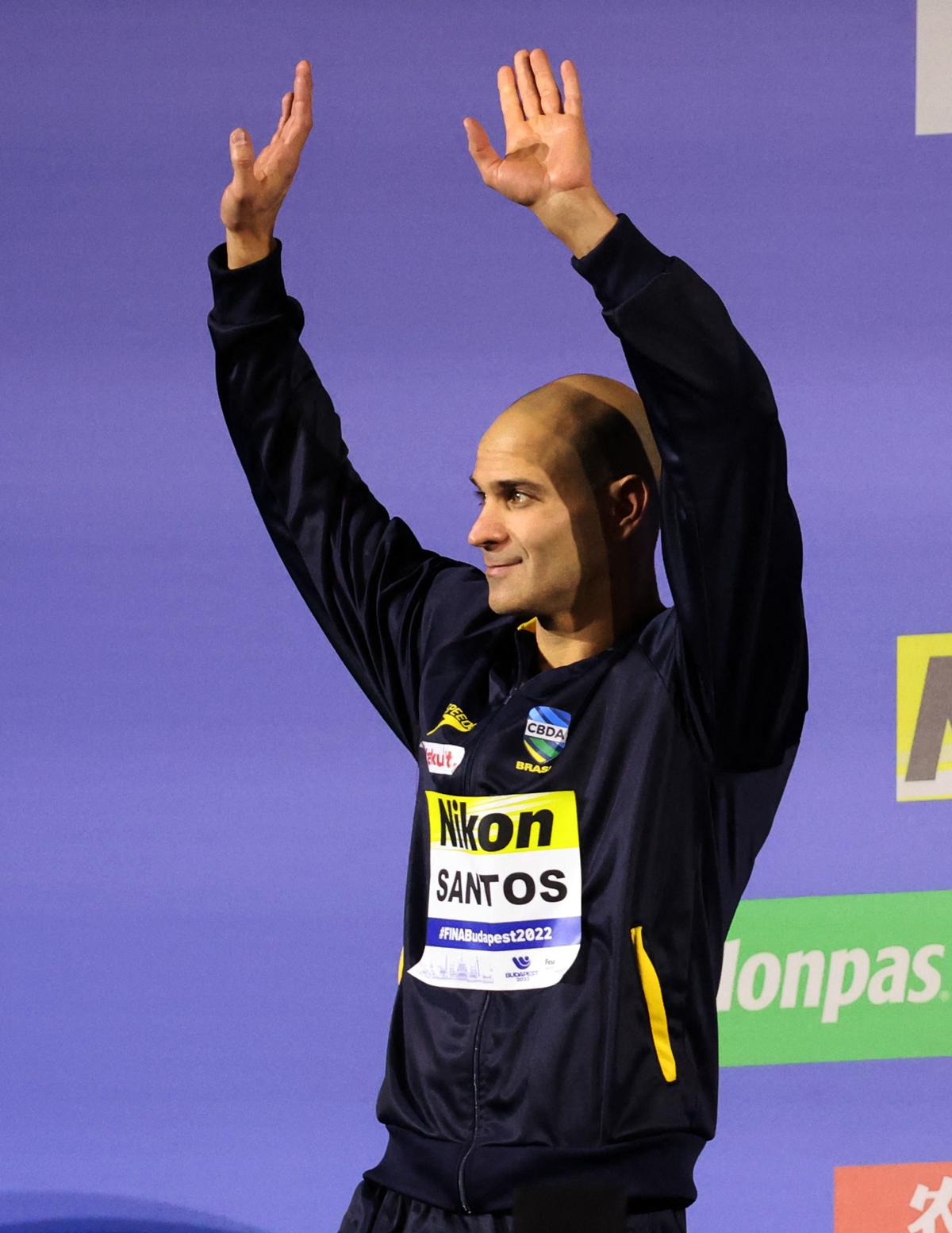 Men’s 50m butterfly silver medallist, Brazil’s Nicholas Santos on the podium after the final 