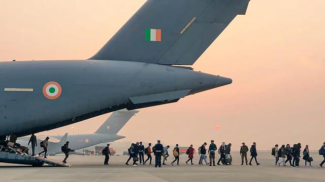 Indian nationals, evacuated from war-torn Ukraine, on their arrival at the Hindon airbase, in Ghaziabad. Three more IAF C-17 aircrafts returned to Hindan airbase late Thursday night and early Friday morning carrying 630 Indian nationals, using airfields in Romania and Hungary. 