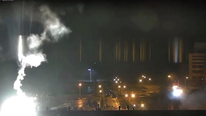 Surveillance camera footage shows Zaporizhzhia nuclear power plant during shelling in Enerhodar, Zaporizhia Oblast, Ukraine on March 4, 2022, in this screengrab from a video obtained from social media. Zaporizhzhya NPP via YouTube/via REUTERS  