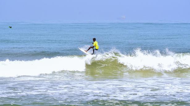Surfing begins amid challenging conditions
