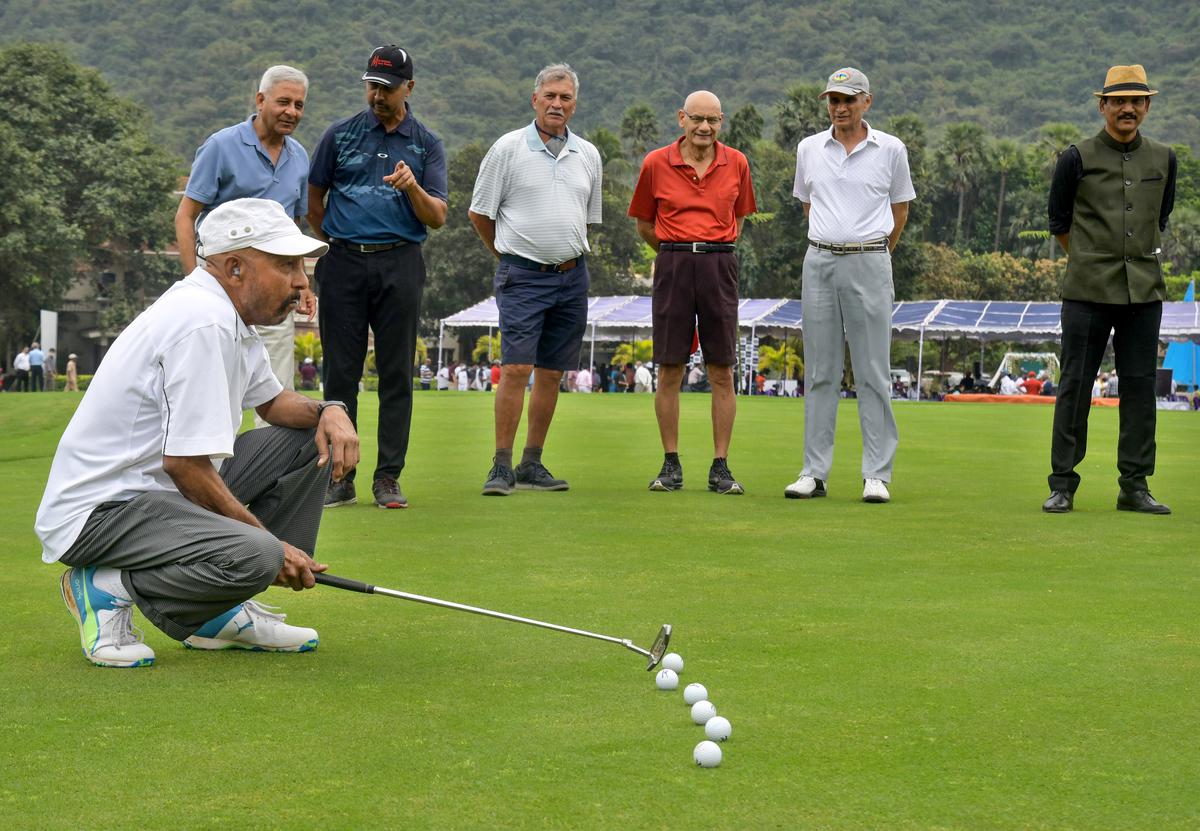 Former cricketer Syed Kirmani preparing to take a swing at the East Point Golf Club at the renovated Championship Golf Course in Visakhapatnam