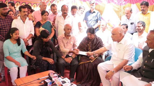 BSY hands over cheque of ₹25 lakh to murdered Bajrang Dal Activist’s family